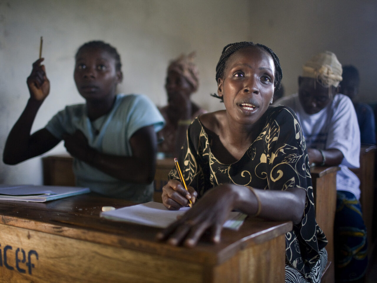 UNMIL Photo/Christophe Herwig - Ganta, Liberia, July 30, 2008 :  The Ganta Concerned Womens Group has organized a pilot project to teach women in Tonglewin village how to read and do basic mathematics. 
Liberias electricity system was destroyed in the war, and power has not yet been restored. Classes are conducted in semi-darkness twice a week.